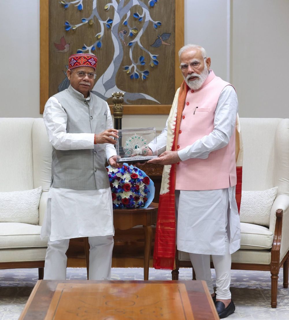 Modi moves towards a historic milestone as the longest-serving Prime Minister; Telangana Governor Shiv Pratap Shukla extends congratulations.